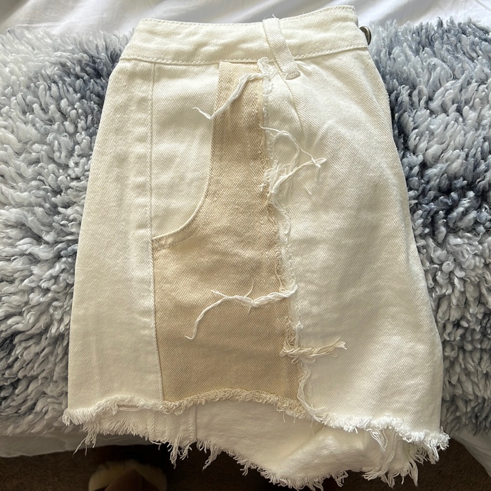 White and tan high waisted shorts